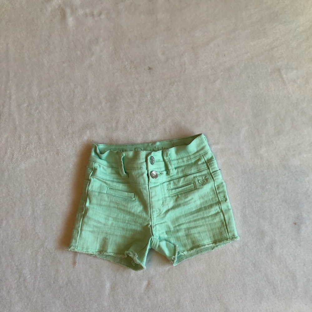 Mint colored Justice shorts for girls
